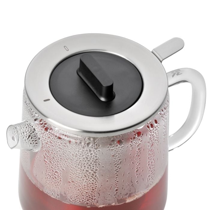 Tea pot with tea strainer and Rechaud SENSITEA